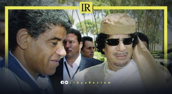former Intelligence Chief Abdullah Al-Senussi and late Libyan leader Muammar Gaddafi