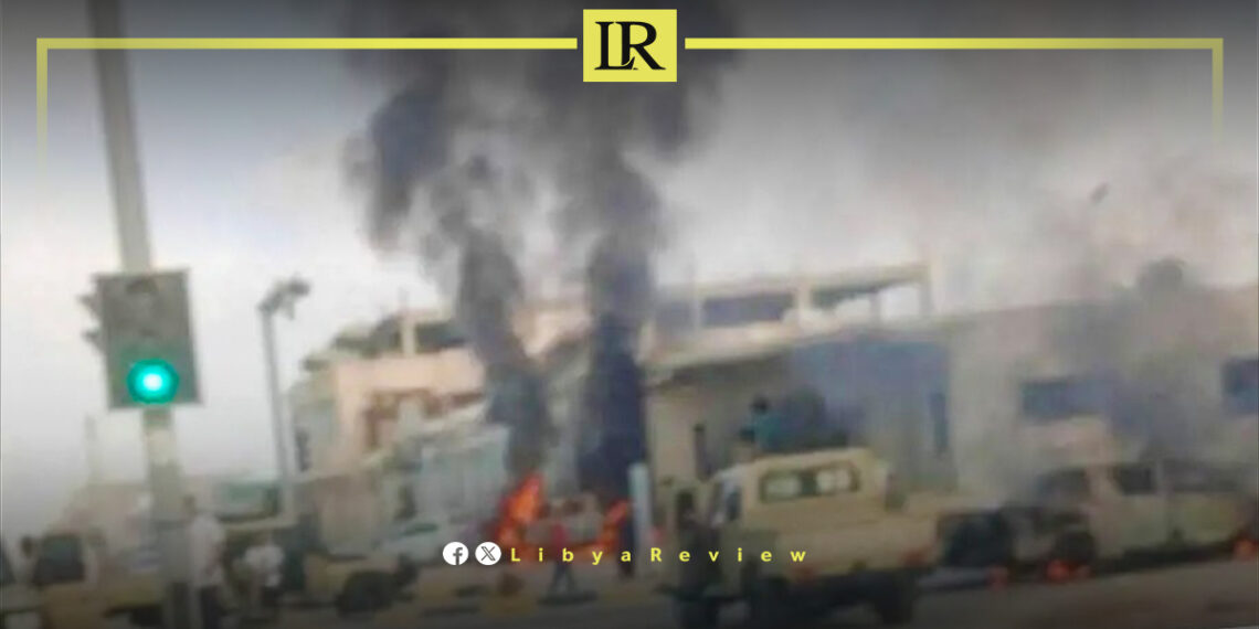 Vehicles Burned After Armed Clash in Al-Zawiya
